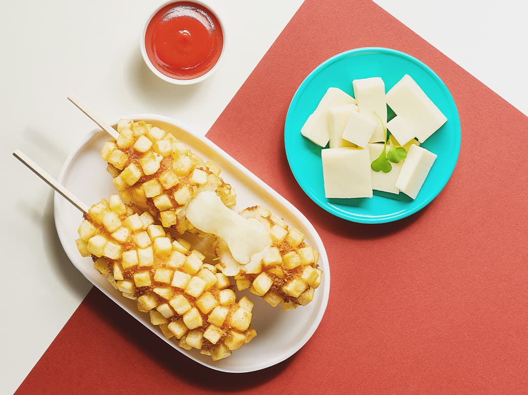 Juicy cheeseburger with a side of crispy fries